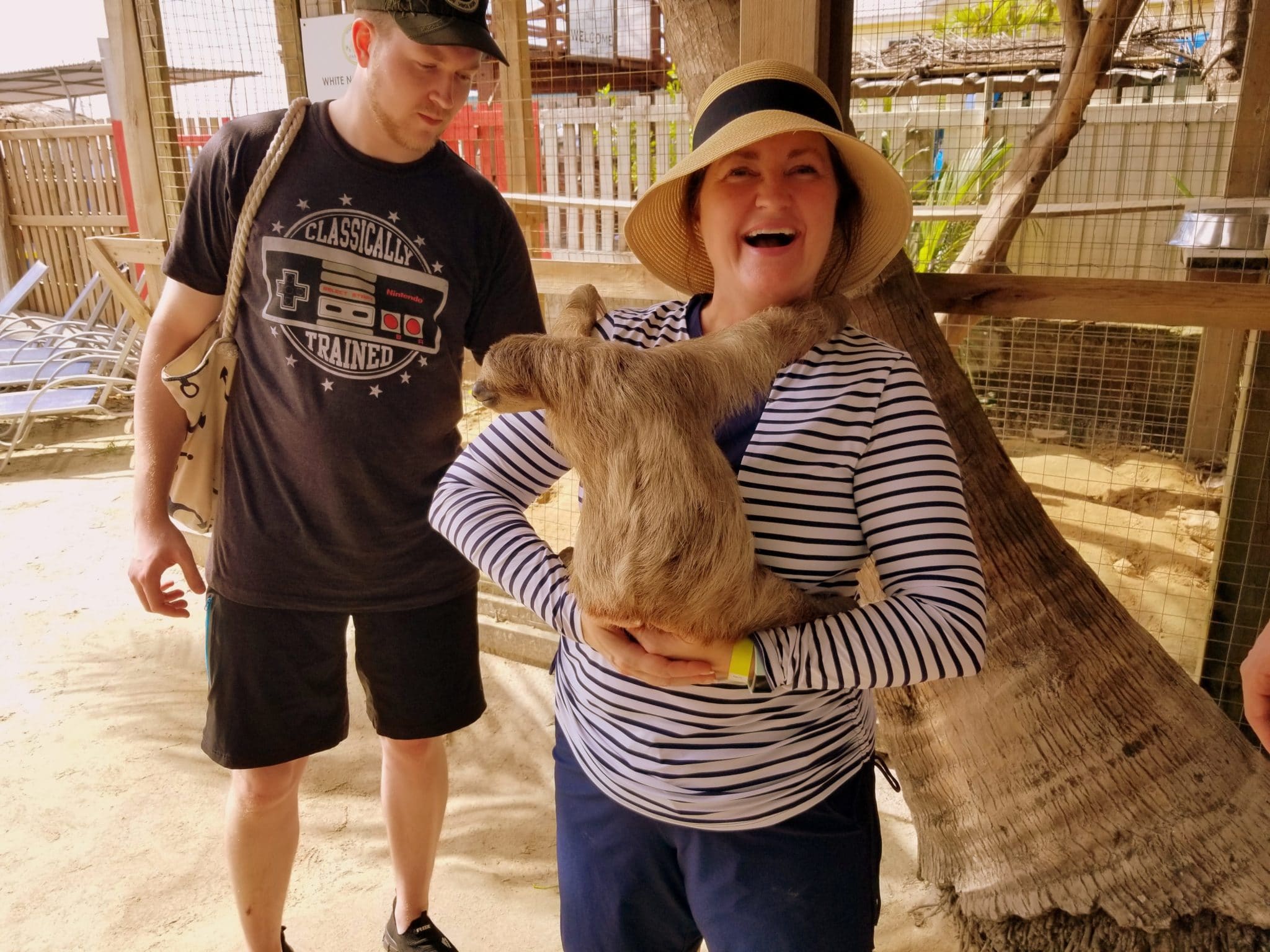 Lisa Van Gemert holding a sloth Lisa Van Gemert holding a sloth