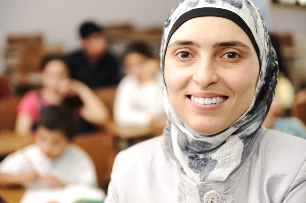 muslim female teacher with class