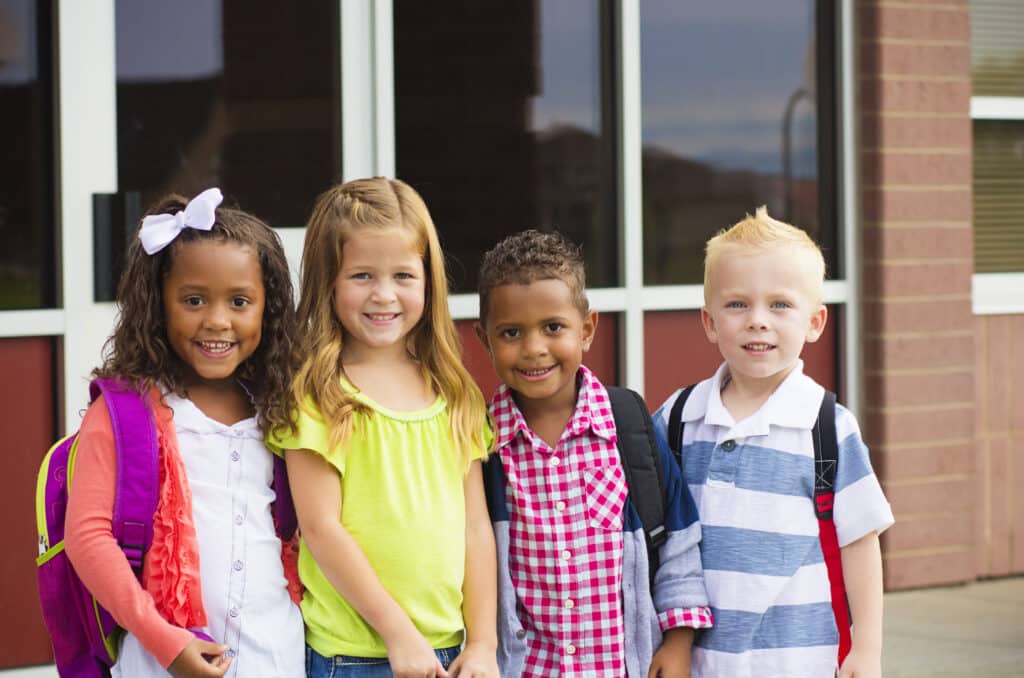 group of four elementary students